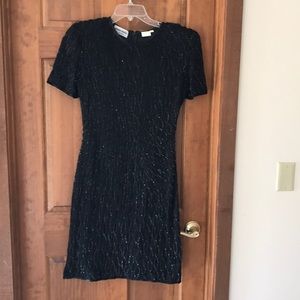 Sequined details on black evening dress